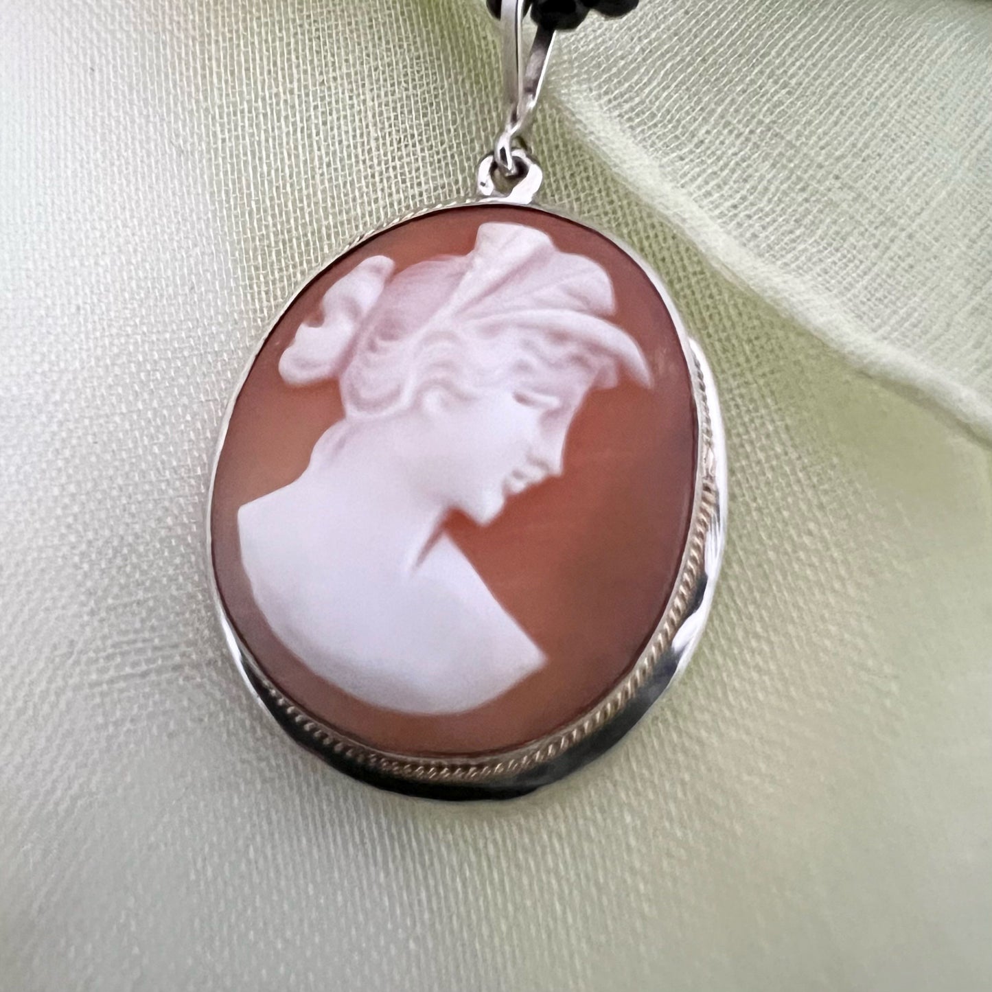 Antique sterling silver pendant with vintage 1950 shell cameo